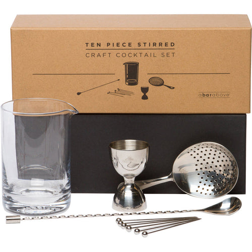 A 10-piece stirred cocktail set: polished stainless steel tools, glass beaker, and brown packaging.