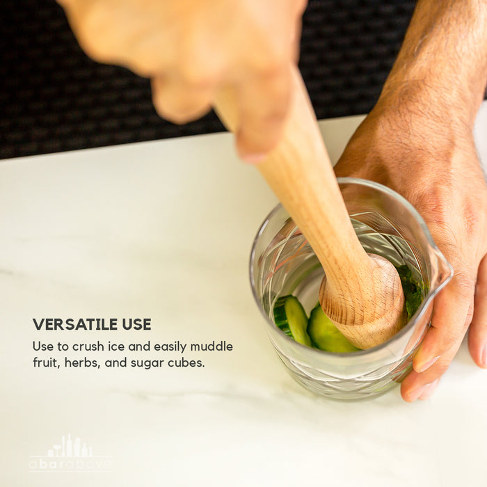 Infographic demonstrating versatile uses for a cocktail muddler, with a wooden muddler shown in a mixing glass (details in description).