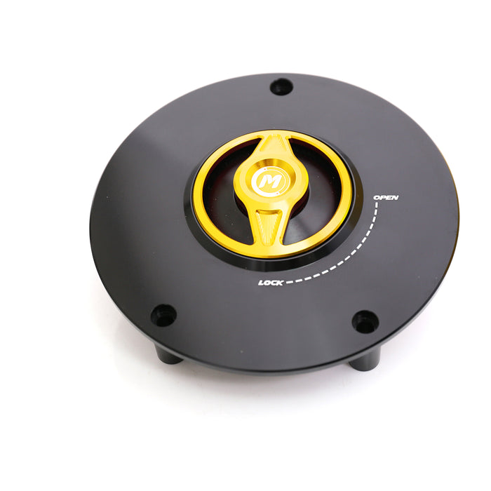 MC Motoparts CNC quick lock fuel cap for Honda CBF600, VFR1200, CB1000R motorcycle, shiny metal finish with locking mechanism.