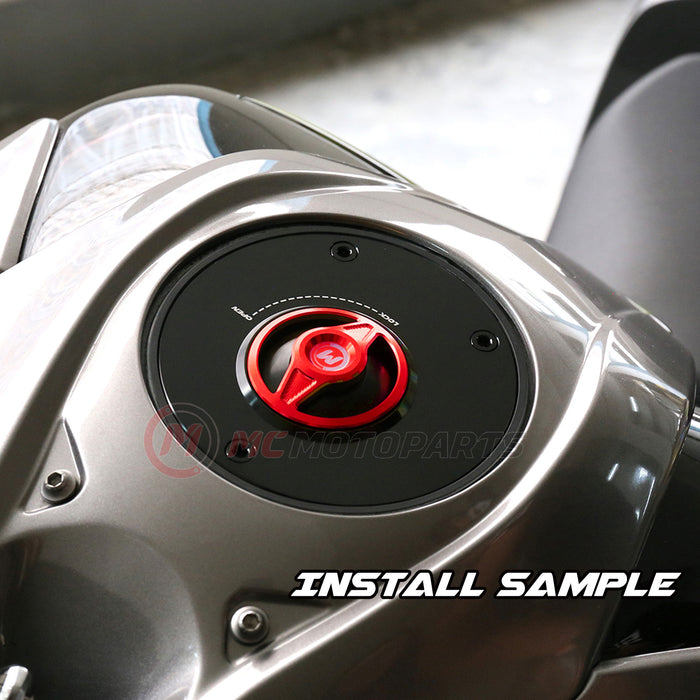 MC Motoparts CNC quick lock fuel cap for Honda CBF600, VFR1200, CB1000R, with a sleek design and secure locking mechanism.