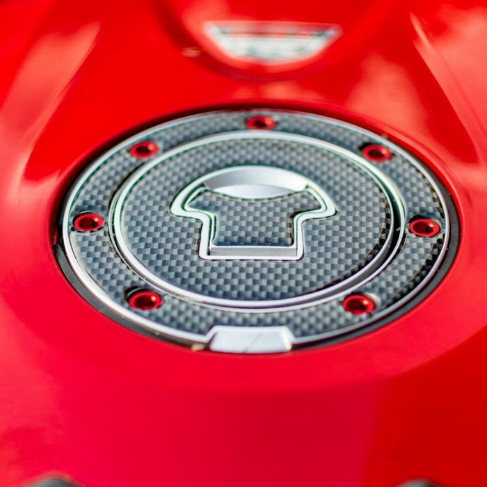 MC Motoparts CNC fuel cap bolts for Honda CBR600RR, CB1000R, and CB900F motorcycle fuel caps, shown in red on the bike.