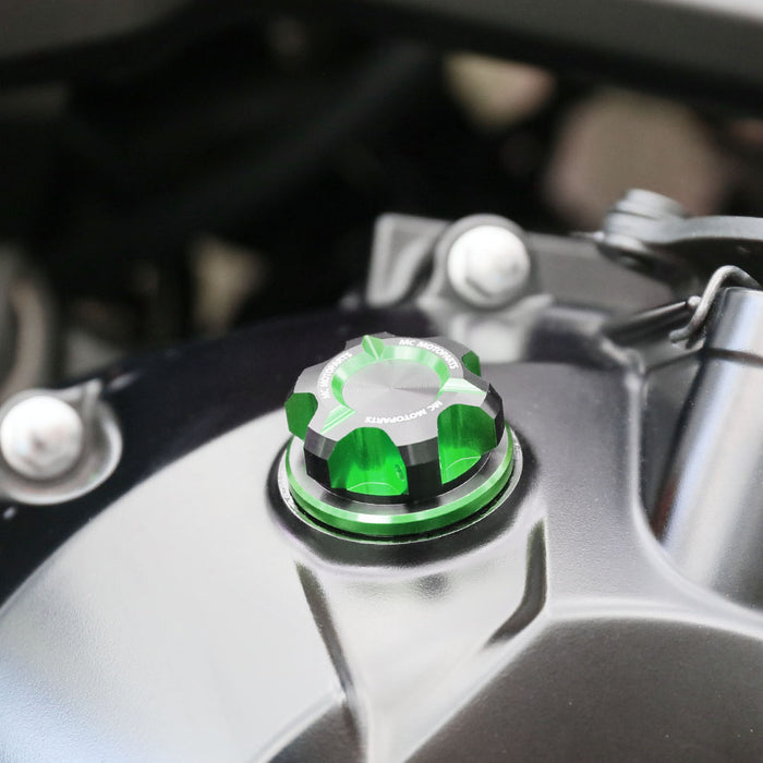CNC aluminum oil filler cap for Kawasaki ER6F, ER6N, Z900RS, Z650, Z800 motorcycles by MC Motoparts, shown installed on bike.
