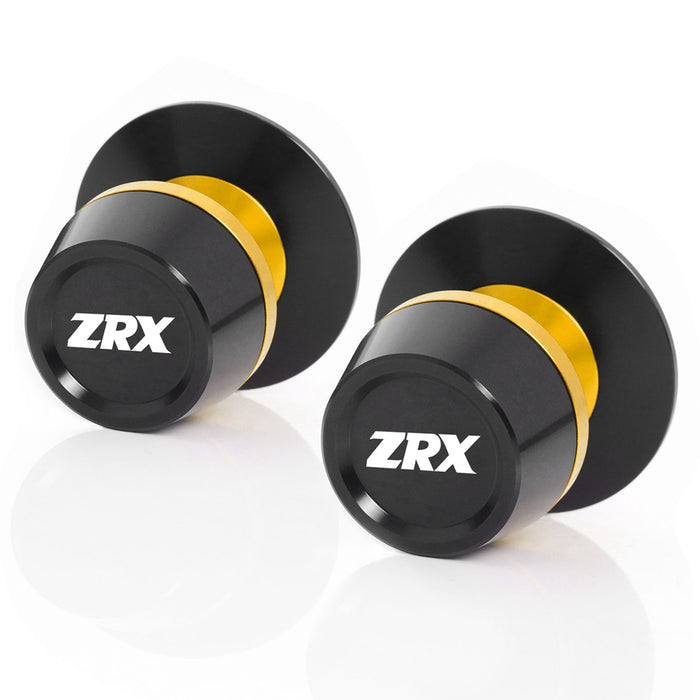 Kawasaki ZRX1200 R swingarm spools by MC Motoparts with engraved logo, 10mm diameter, mounted on motorcycle swingarm.