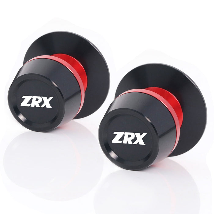 Kawasaki ZRX1200 R swingarm spools by MC Motoparts with engraved logo, designed for easy motorcycle wheel removal.