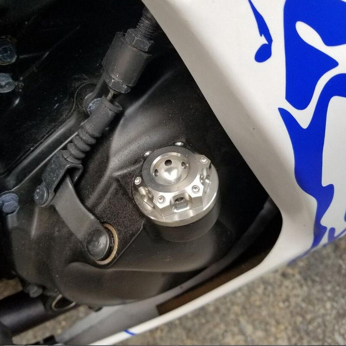 CNC oil filler cap for Kawasaki ZX-10R, ZX14R, Z750R, Ninja 300 by MC Motoparts, with a metallic finish and precise fit.
