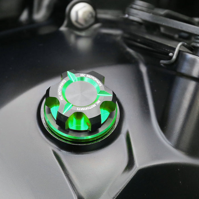 MC Motoparts CNC oil filler cap for Kawasaki ZX6R, ZX6RR, ZX14R, ZX10R motorcycles, shown installed on bike engine.