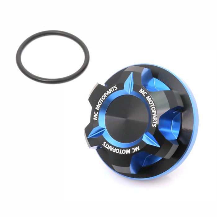 CNC aluminum oil filler cap for Kawasaki ZX6R, ZX6RR, ZX14R, ZX10R motorcycles by MC Motoparts, close-up view showing detailed machining