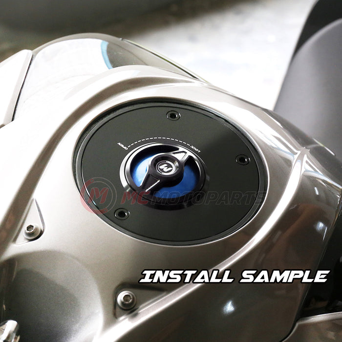 MC Motoparts CNC quick release fuel cap for Suzuki Bandit GSF600 and GSF1200 motorcycles with blue finish and secure locking mechanism.