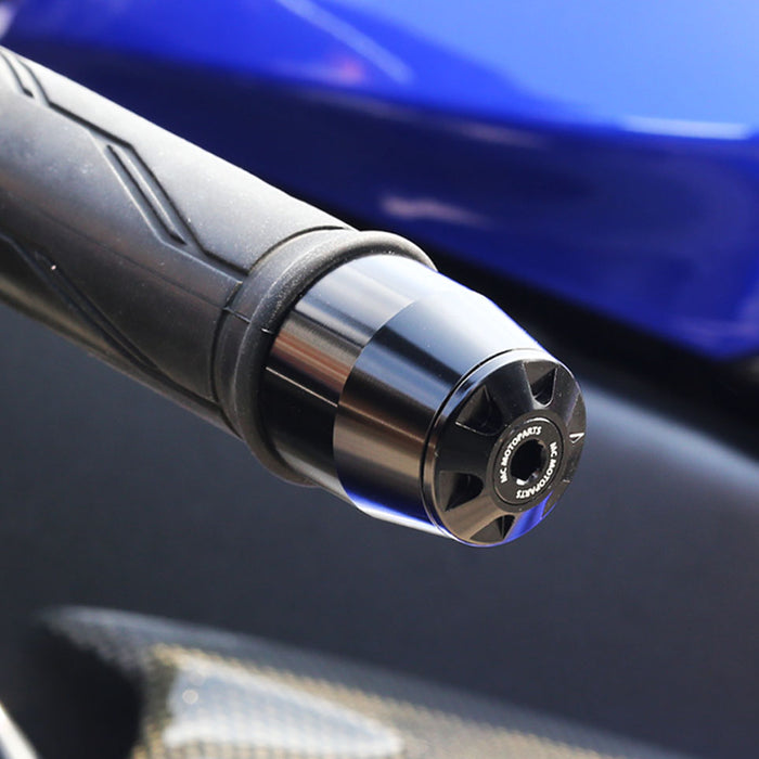 Black CNC bar ends for Suzuki GSX-R 600, 750, 1100, and 1000 motorcycles, designed for durability and style by MC Motoparts.