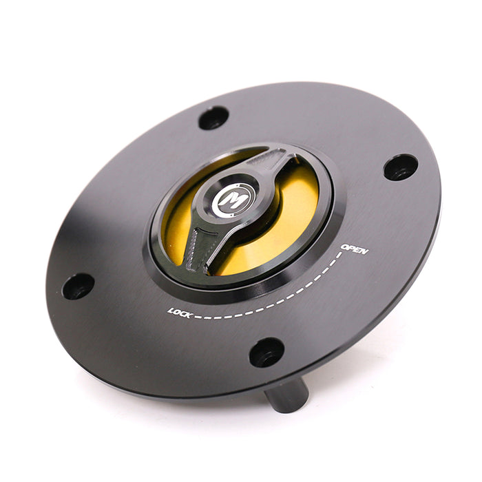 CNC aluminum quick release fuel cap for Suzuki GSX-R600, GSXR750, and 1000 motorcycles by MC Motoparts, featuring a gold finish.