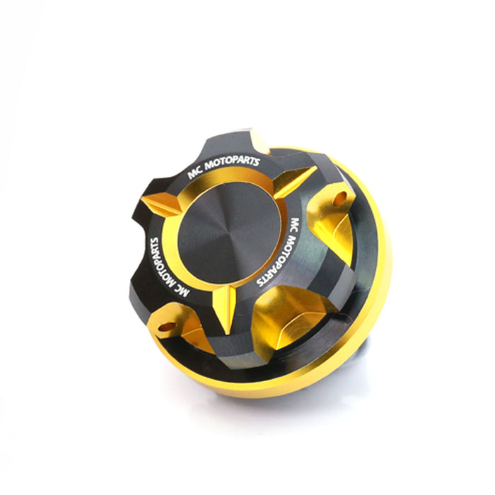 CNC aluminum oil filler cap for Suzuki GSXR 600 750 1000 GSR600 motorcycle, black with gold accents, by MC Motoparts.