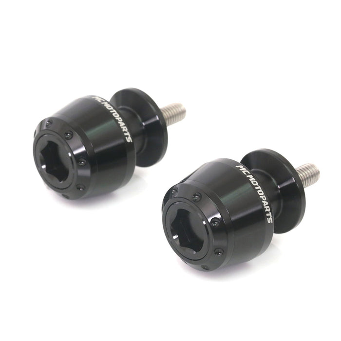 Black MC Motoparts swingarm spools for Ducati 899, 959 Panigale, Monster 821, and ATOM 6mm paddock stand compatibility.
