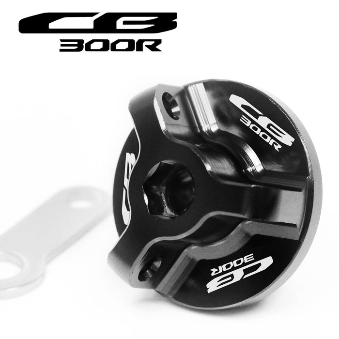 Black engraved oil filler cap for Honda CB300R 2012-2024, branded MC Motoparts, designed to fit and replace the original.