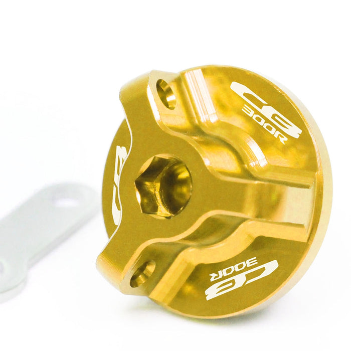Honda CB300R 2012-2024 oil filler cap by MC Motoparts with engraved logo, chrome finish, and precise fit.