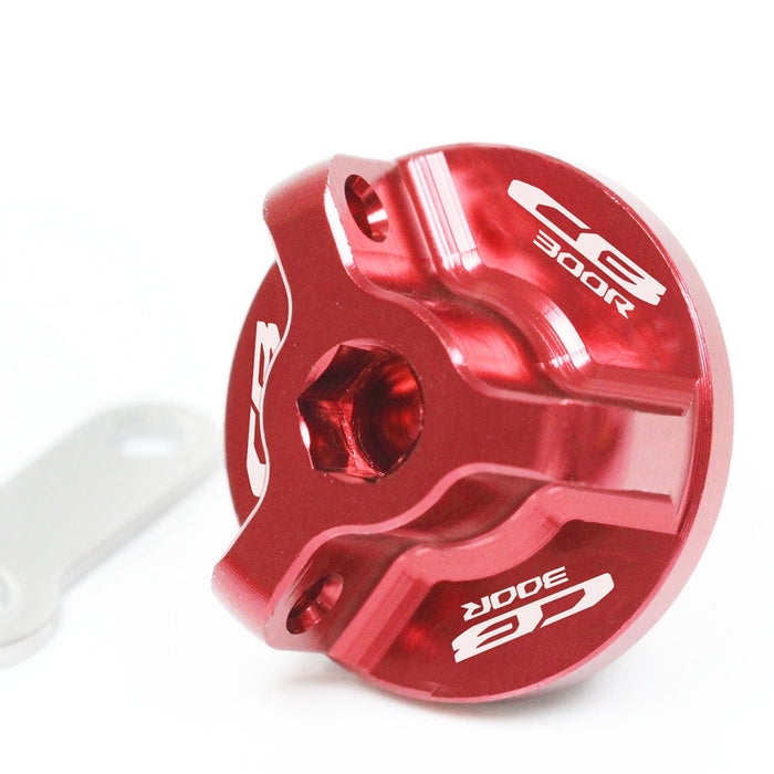 Honda CB300R 2012-2024 oil filler cap with MC Motoparts logo engraving, sturdy metal construction, and vibrant red color.