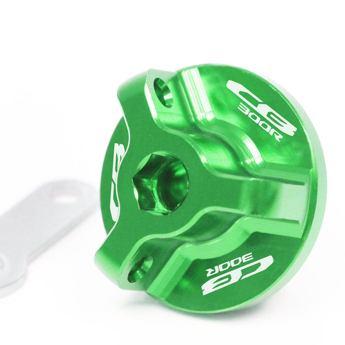Honda CB300R 2012-2024 oil filler cap by MC Motoparts with engraved logo, black metal finish, and secure screw-on design.
