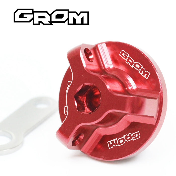 Honda GROM 125 MSX125 oil filler cap by MC Motoparts with engraved logo, featuring red finish and detailed design.