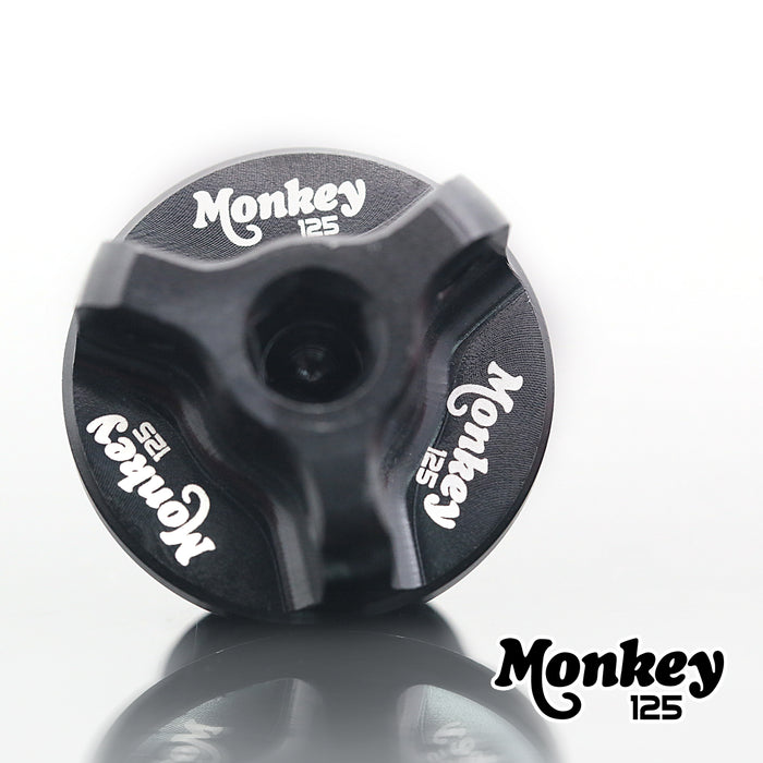 Black MC Motoparts oil filler cap with engraved Honda Monkey logo for Z125M Z125MA 2018-2025 motorcycle engine.