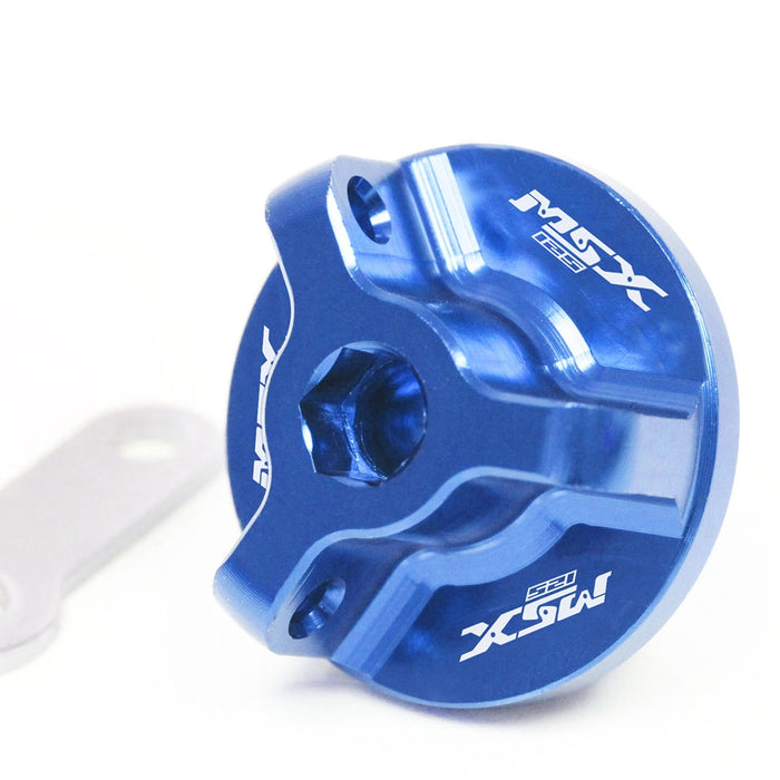 Honda MSX 125 GROM oil filler cap by MC Motoparts with engraved logo, blue finish, fits models from 2014 to 2025.
