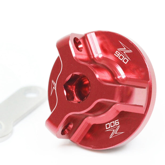 Kawasaki Z900 2017-2024 oil filler cap with engraved logo by MC Motoparts, showcasing a red finish and detailed branding.
