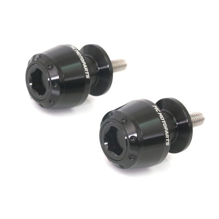 Black MC Motoparts swingarm spools for Suzuki GSX250R, GSXR125, GSXS1000, 8mm paddock stand mounts on motorcycle swingarm.