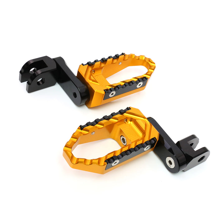 MC Motoparts 40mm extension foot pegs for Aprilia Mana 850 and RSV4 TRC touring motorcycles, adjustable wide foot pegs on black finish.