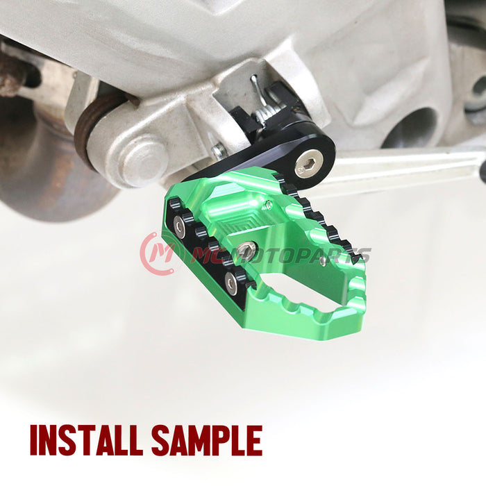 Honda motorcycle 40mm extension foot pegs by MC Motoparts, wide, adjustable touring foot pegs for CBR250RR, CBR600RR, and CBR1000RR.