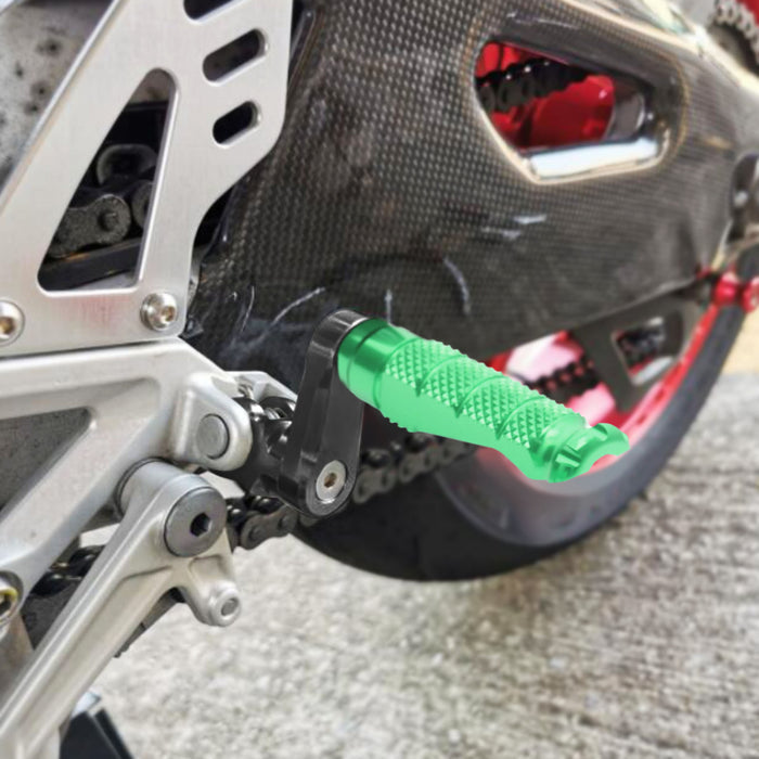 Front view of MC Motoparts 40mm adjustable foot pegs for Kawasaki GTR1400, Versys 1000, 650 R-FIGHT motorcycle, installed on the bike.