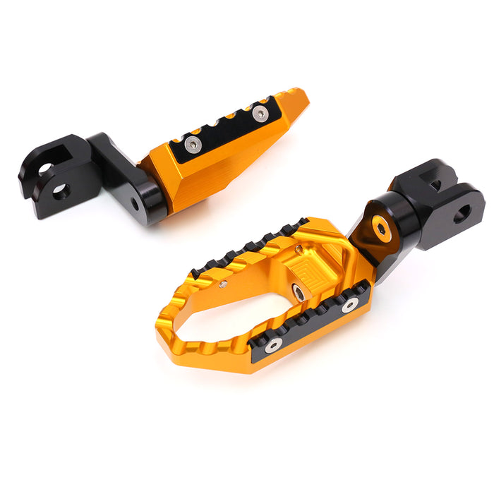 Black MC Motoparts 40mm extension foot pegs for Kawasaki Ninja 650R 300 400 TRC touring bikes, featuring multi-step wide design.