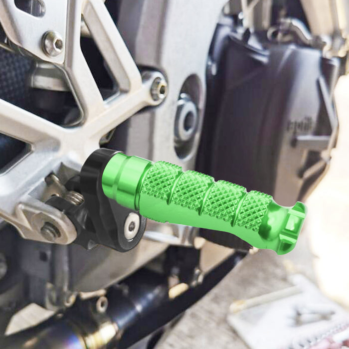 Front view of MC Motoparts 25mm extension foot pegs for Kawasaki Versys 1000, 650 Versys-X 300 R-FIGHT motorcycle, installed on rider foot area.