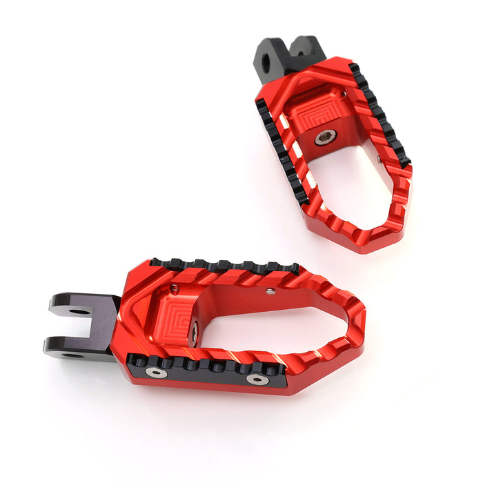 MC Motoparts touring foot pegs for Triumph Scrambler Speed Triple 955i, black metal footrests with a sturdy design.
