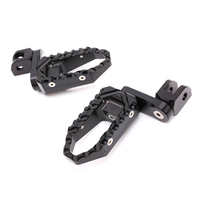 Front view of MC Motoparts 40mm extension foot pegs for Triumph Speed Triple R and Street Triple TRC touring bikes.