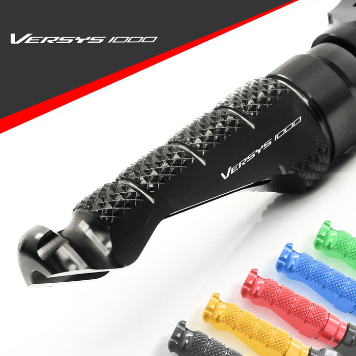 Front MC Motoparts R-FIGHT foot pegs for Kawasaki Versys 1000 2012-2024, engraved logo, durable motorcycle foot pegs.