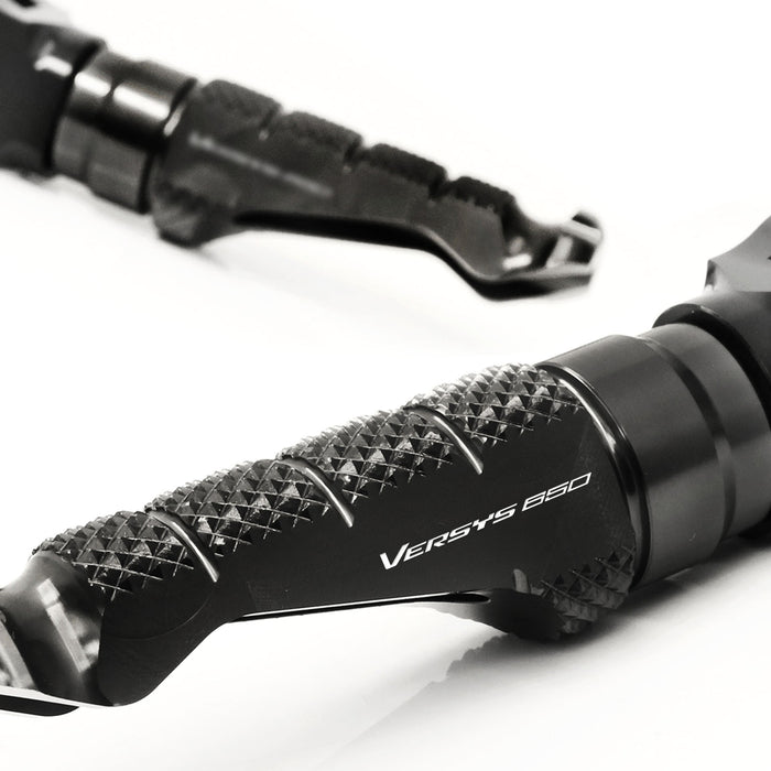 Front R-FIGHT engraved logo foot pegs for Kawasaki Versys 650 from MC Motoparts, durable standard motorcycle foot pegs.