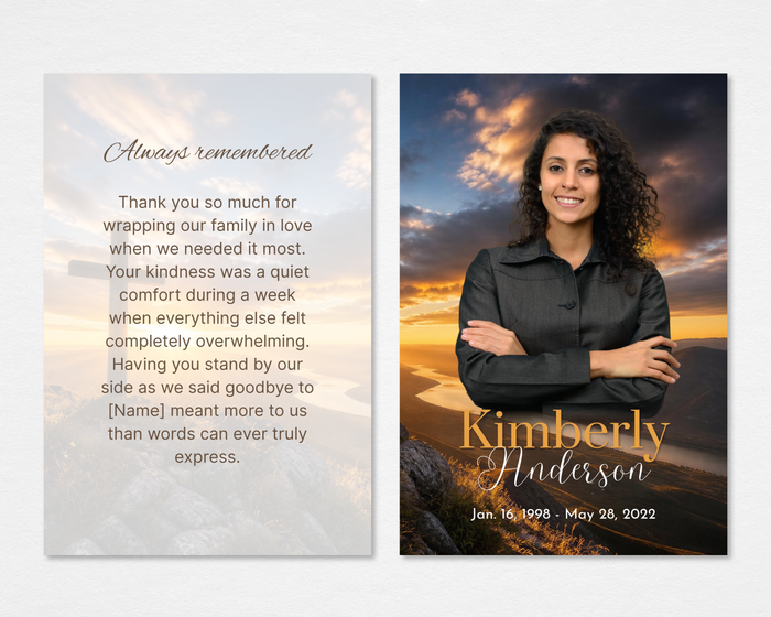 Golden Sunset Cross memorial thank you card — dramatic golden mountain sunset background with full-bleed portrait photo placeholder, bold gold script name and dates on front; soft cloud sky background with "Always Remembered" script header and editable thank you message on back — front and back