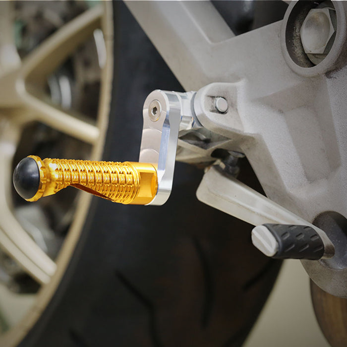 Rear 40mm adjustable M-PRO foot pegs for Honda CBR1000RR and CBR600RR motorcycle, shown installed on bike.