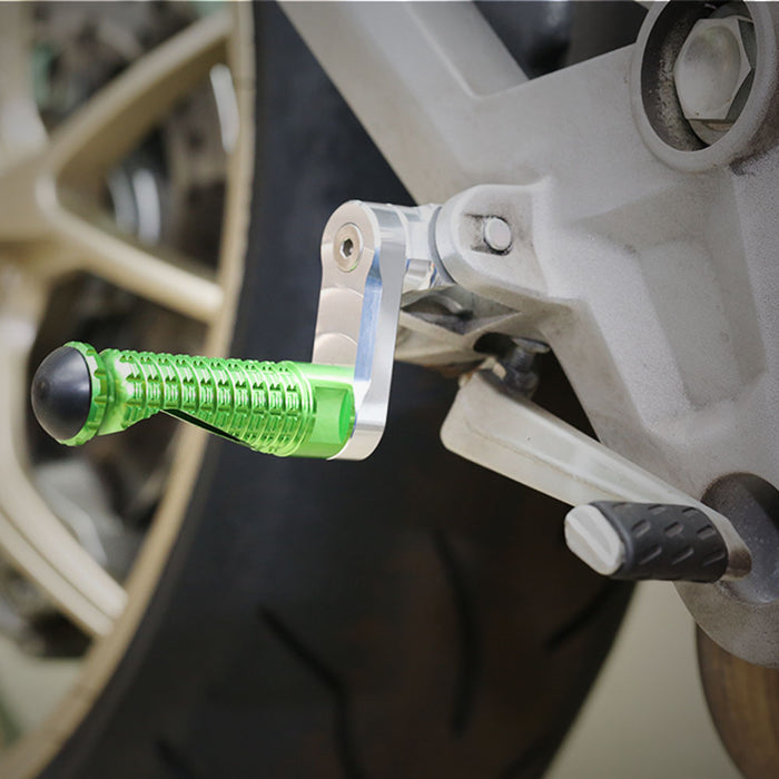 Rear 40mm extension foot pegs for Kawasaki Z750 Z650 Z1000 by MC Motoparts, shown installed on motorcycle for lowered riding position.
