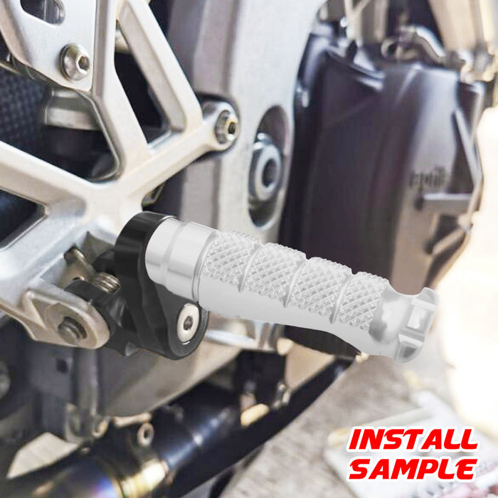 Rear 25mm extension foot pegs for Suzuki GSX-R 600 750 1000 motorcycle by MC Motoparts, shown installed on bike.