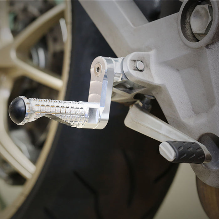 Rear 40mm adjustable M-PRO foot pegs for Suzuki GSX-R600 Hayabusa by MC Motoparts, shown installed on motorcycle.