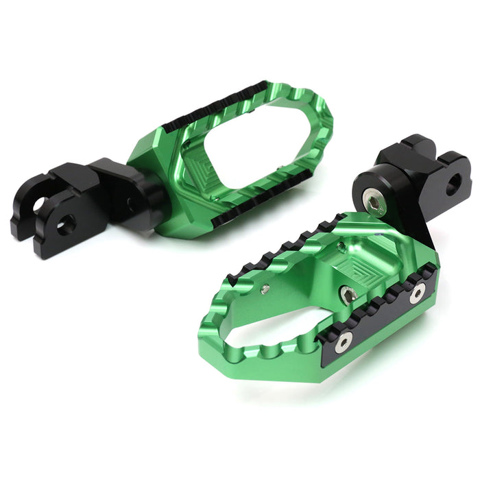 Rear 25mm extension touring wide foot pegs for Suzuki SV650 and SV1000 by MC Motoparts, black metal with textured grip surface.