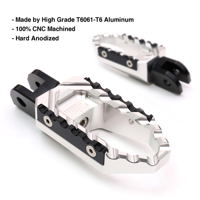 Rear MC Motoparts touring wide foot pegs for Suzuki SV650 and SV1000 motorcycle, black standard foot pegs with textured surface.