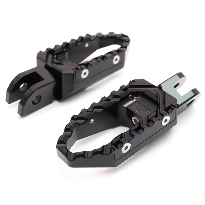 Rear MC Motoparts touring wide foot pegs for Suzuki SV650 and SV1000 motorcycle, standard foot pegs with black finish.