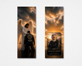 Ride Home memorial bookmark — angel with outstretched wings blessing a kneeling biker in leather jacket against dramatic golden stormy sky on front; rectangular portrait photo, ornate black nameplate, gold script "Forever in Our Hearts," bold name, and dates on back — front and back
